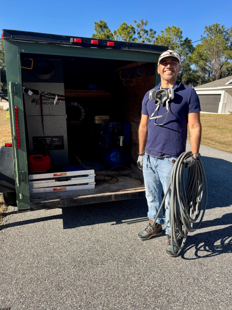 Boris with Coastal Air Duct & Dryer Vent Services trailer preparing for air duct and dryer vent cleaning in Palm Coast Florida